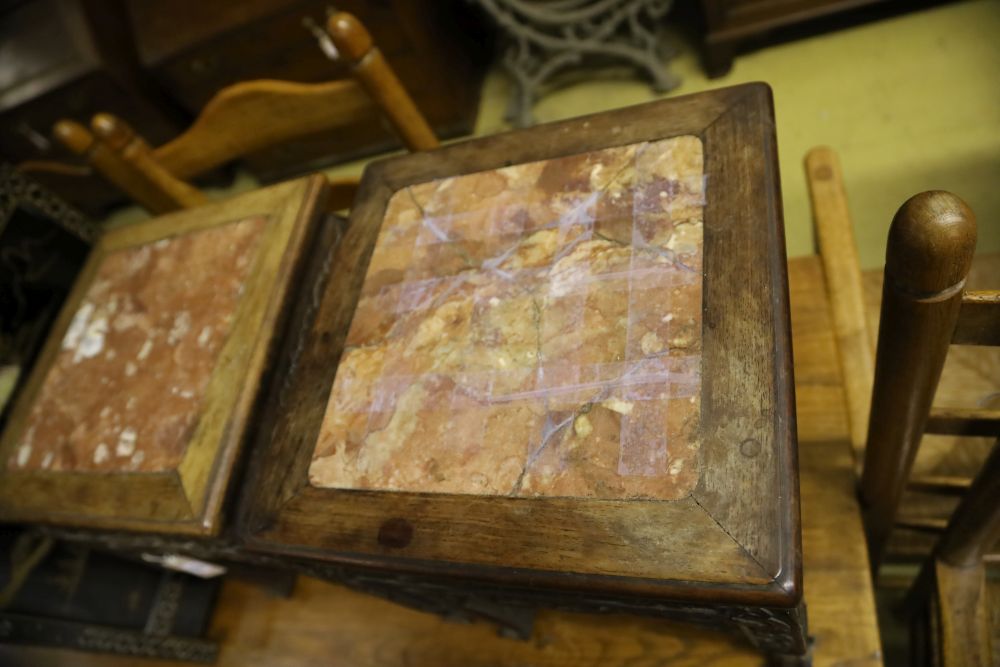 A pair of Chinese rectangular carved and pierced hardwood jardiniere stands with rouge marble tops, width 35cm, height 47cm